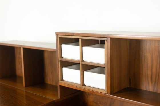 Image 1 of Silvio Coppola, for Bernini. Walnut stepped sideboard. 1960s.