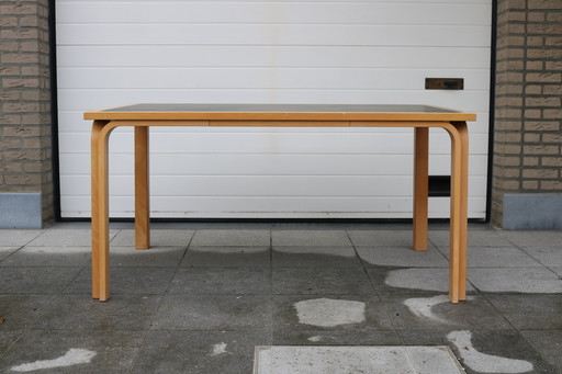 Magnus Olesen Table by Rud Thygesen and Johnny Sorensen