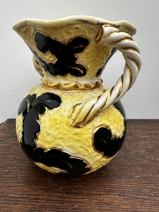 Image 1 of Vase boule jaune et noir rehaussé or attribué Vallauris h 20 cm