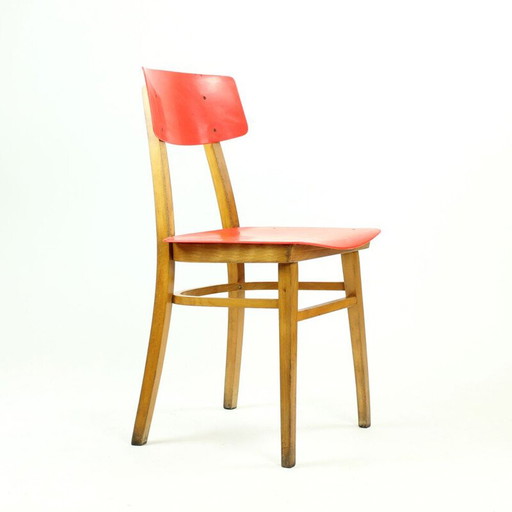 Chaise vintage rouge en plastique et bois de hêtre