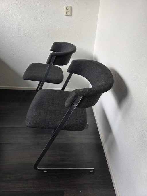 Twee moderne eetkamerstoelen nieuw bekleed antraciet