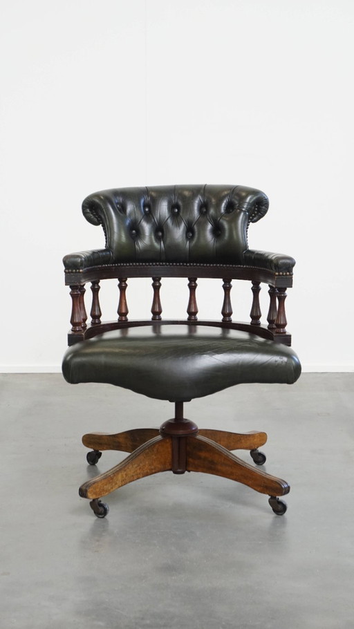 Dark green cowhide leather and wood height-adjustable, swivel and tilt Chesterfield office chair