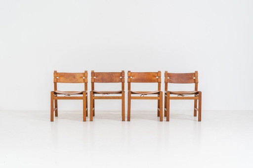 Eikenhouten en lederen eetkamerstoelen (Denemarken, jaren 60).