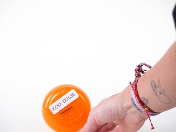 Image 1 of Orange vase, Swing Vase, Danish design, manufactured by Normann Copenhagen, designed by Britta Bonnesen