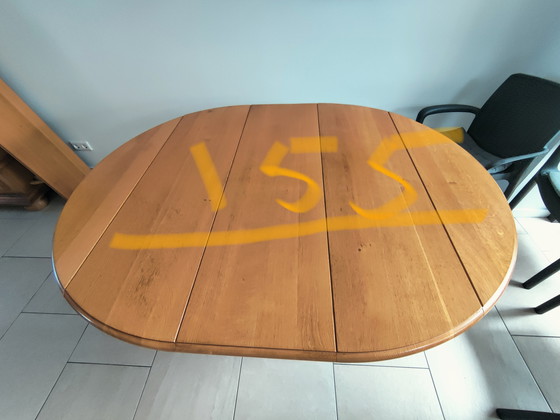 Image 1 of In large adjustable oak table