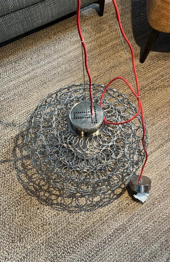 Image 1 of Découvrez l'art de la lumière : la suspension ovale Terzani GRA