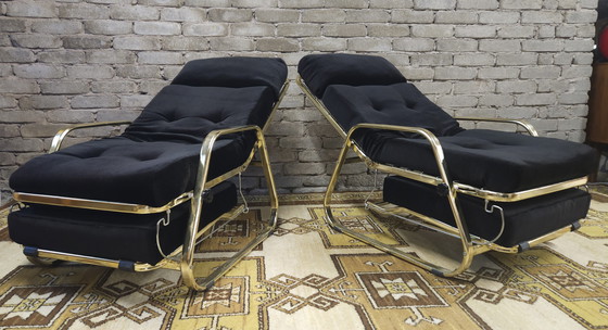 Image 1 of Paire de fauteuils noir système "Morris "1970