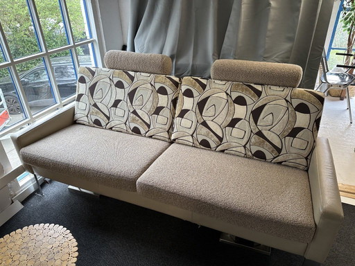 Elegante sofá Leolux + sillón