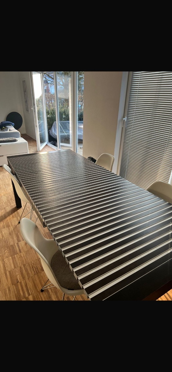 Image 1 of Black extendable dining table