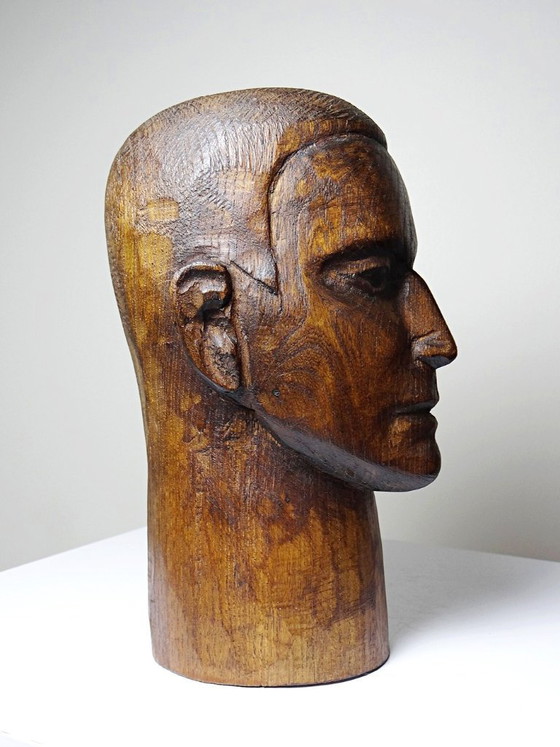Image 1 of Een sculptuur uit één stuk hout, voorstellende een mannenhoofd, vintage vakmanschap uit de 20e eeuw (jaren 1950).