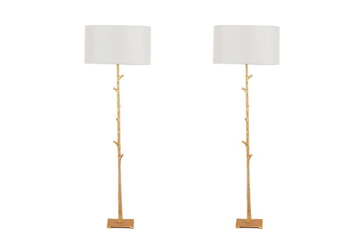 Pair of gilded metal floor lamps. 20th century.