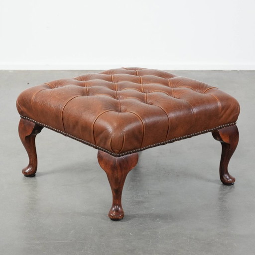 Elegante reposapiés Chesterfield de piel de vacuno