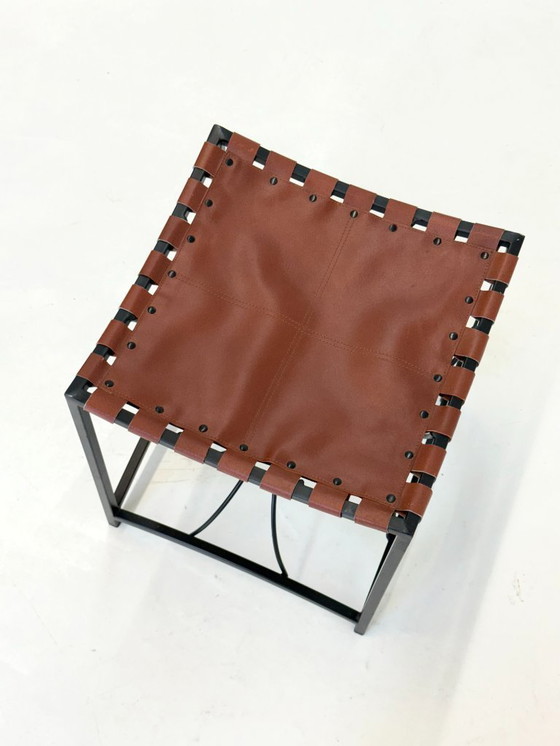 Image 1 of French elegant vintage stool with black metal and brown leather