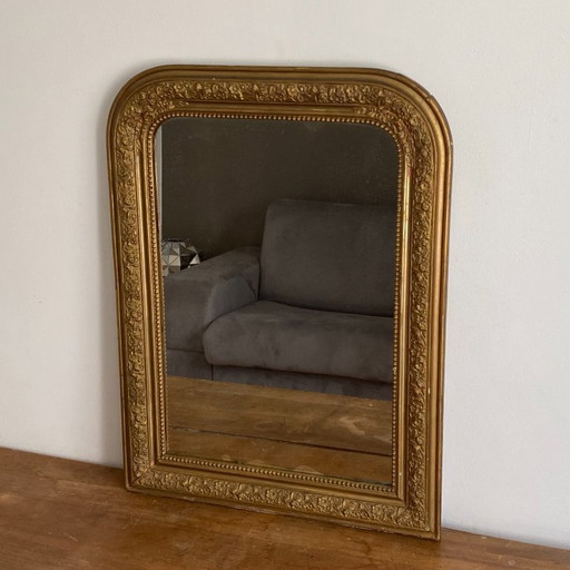 Louis Philippe mirror, late 19th century. Gilt. 75x56.