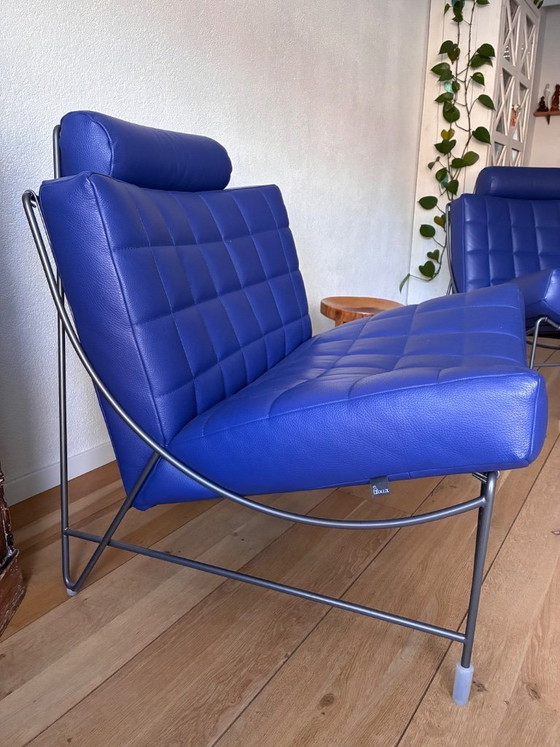 Image 1 of Deux fauteuils Leolux Volare avec repose-pieds