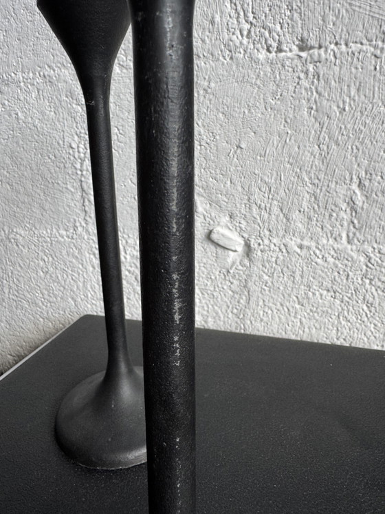 Image 1 of Black Memphis-style candlesticks from the 1980s