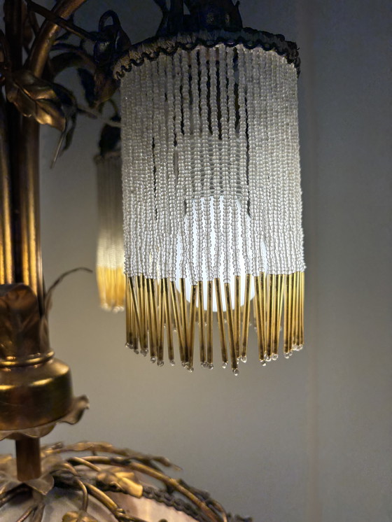 Image 1 of Exclusive chandelier with brass leaves and silver-colored roses