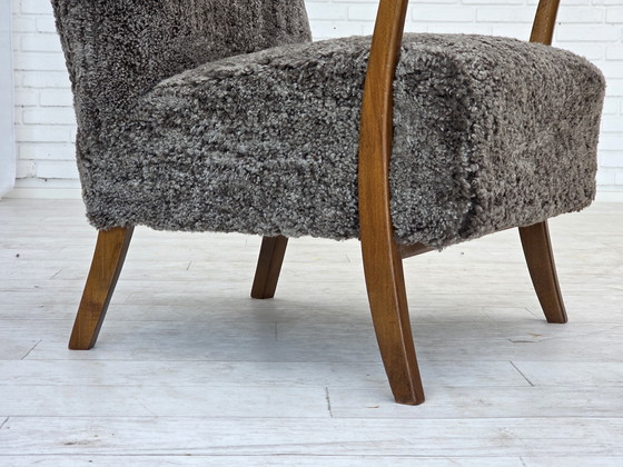 Image 1 of 1960s Reupholstered Danish Armchair with Stool, Genuine Sheepskin