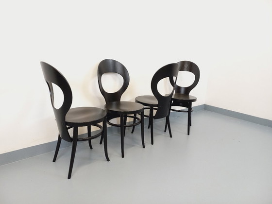 Image 1 of Set van 4 vintage Baumann Mouette stoelen in zwart hout uit de jaren 70.