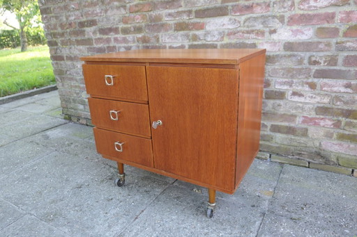 Vintage teak cabinet on wheels
