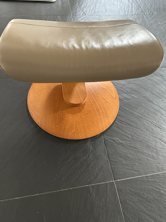 Image 1 of Taupe armchair with footstool