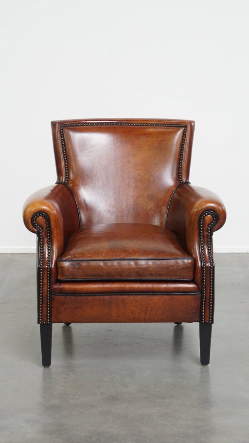 Fauteuil en peau de mouton à la finition luxueuse