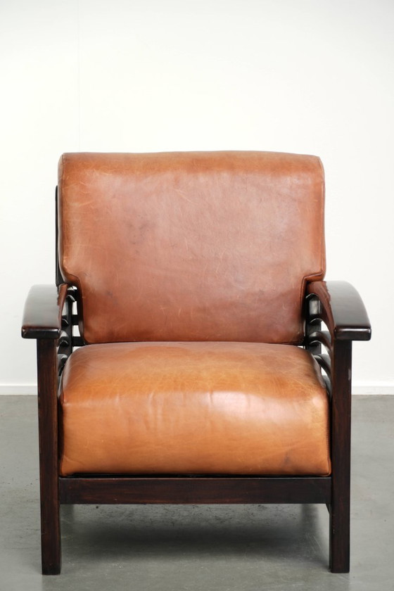 Elegant cowhide armchair with beautiful details in timeless Art Deco design – Leather, Klassiek (photo 2 of 12)