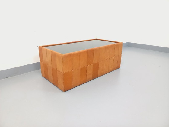 Image 1 of Vintage Swiss rectangular coffee table by De Sede in smoked glass and leather from the 1970s