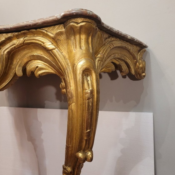 Image 1 of Consolle a muro, in legno intagliato e dorato, stile Luigi XV, XVIII secolo – Francia