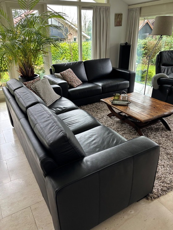 Image 1 of Black leather 2.5 and 3-seater sofa, 4 years old