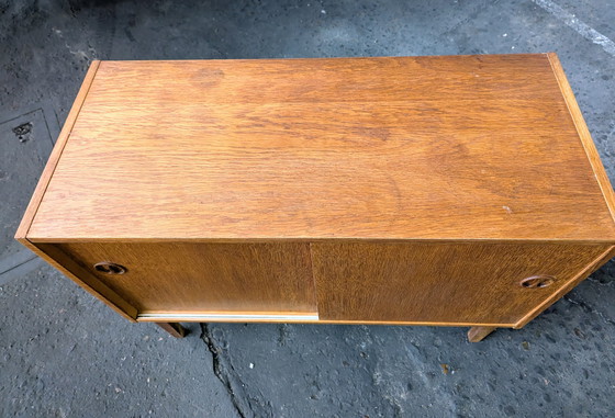 Image 1 of Vintage Deense teak kast met schuifdeuren