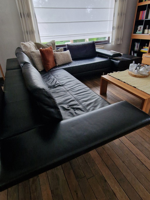 Salon d'angle en cuir avec pouf marque Müsterring