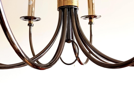 Image 1 of Vintage kroonluchter met 8 armen van zilver en goudkleurig metaal