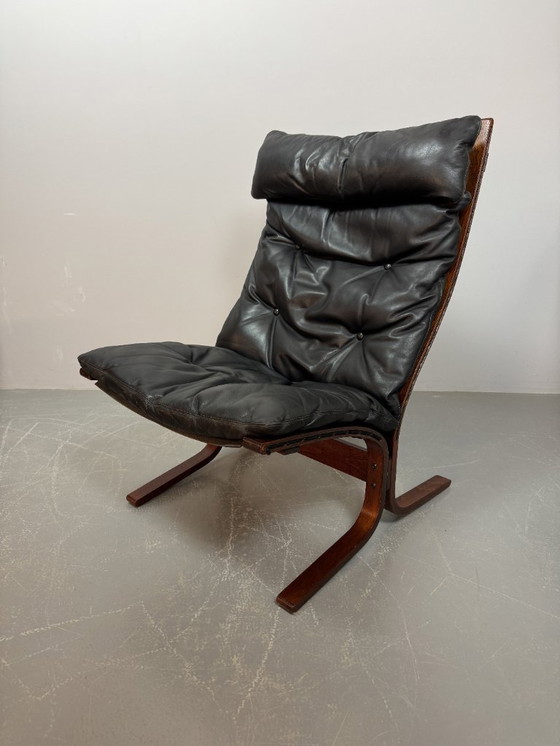 Image 1 of Mid-Century Scandinavian Design Leather Siesta Lounge Chair and Ottoman Designed by Ingmar Relling, Norway 1970s.