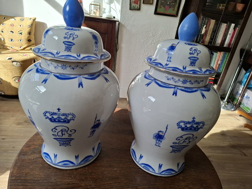 Set of large vintage hand-painted Delft blue Chinoiserie lidded vases.
