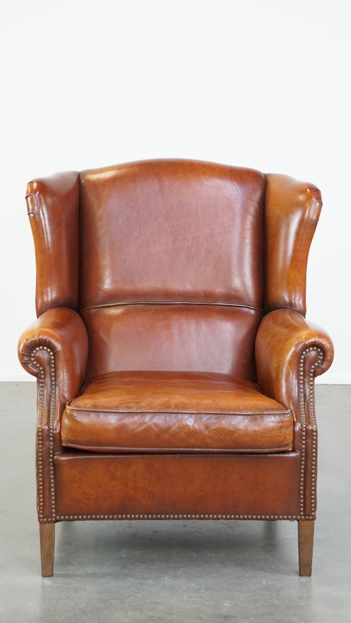 Fauteuil à oreilles en peau de mouton