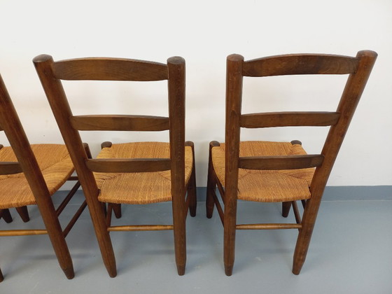 Image 1 of Set van 4 vintage brutalistische stoelen van hout en stro uit de jaren 60.