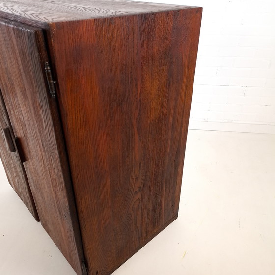 Image 1 of Vintage Art Deco style sideboard with rough dark brown wood