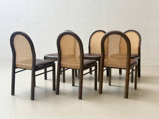 Image 1 of Set van 6 stoelen met rieten en lederen zittingen van Dietiker, jaren 80.