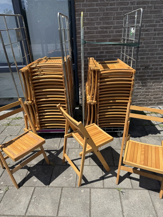 Image 1 of Partij van 53x vintage hardhouten klapstoel ‘80