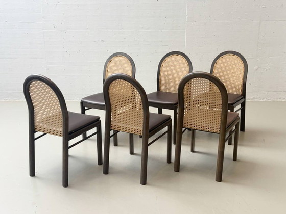 Image 1 of Set van 6 stoelen met rieten en lederen zittingen van Dietiker, jaren 80.