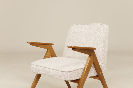 Image 1 of Fauteuil vintage chêne rustique pearl bouclé conclu par Chierowski 