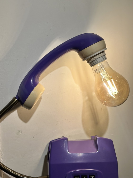 Image 1 of Vintage purple hang-up telephone