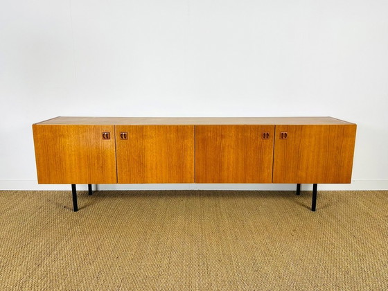 Image 1 of Minimalist Scandinavian sideboard in teak with black metal legs, 1960