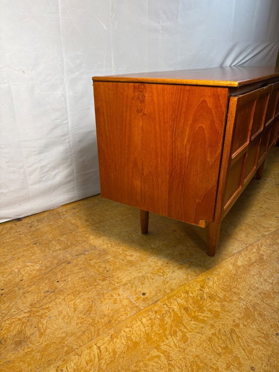 Image 1 of Mid Century Retro Teak Sideboard by Nathan Circa 1960  A classic and highly recognisable mid century modern teak sideboard by Na
