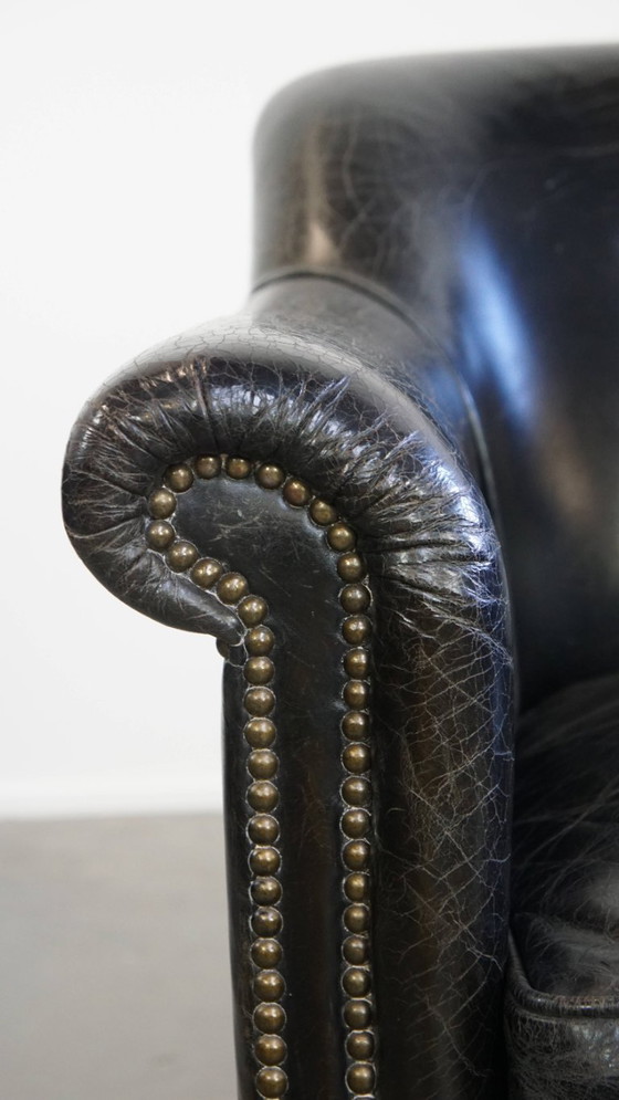 Image 1 of Zwarte generfde rundleren armchair/ fauteuil 