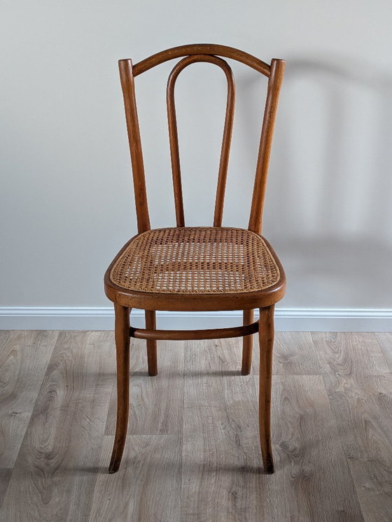 Image 1 of Originele Thonet 56 gebogen houten stoel – Vintage designklassieker