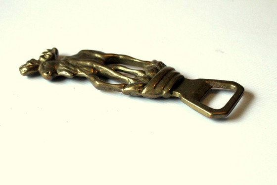 Image 1 of Robusto apribottiglie in ottone con motivo alce - Vintage