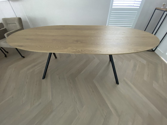 Image 1 of Oval dining table brushed oak with a 10 mm bevel