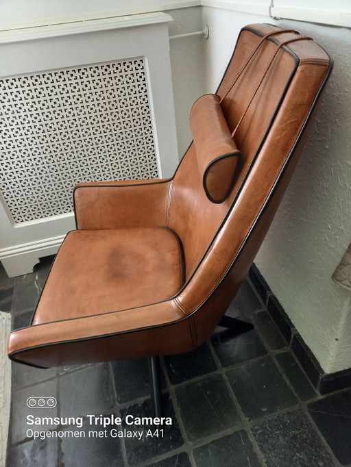 Sheep leather armchair with swivel base